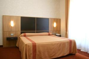 a bedroom with a large bed in a room at Villa Luisa in Todi