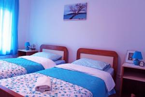 Postel nebo postele na pokoji v ubytování Apartment Ljubica Kaštel Gomilica