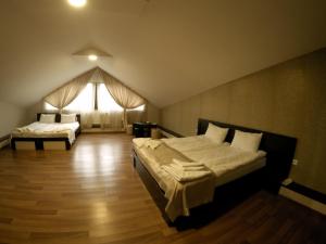 Postel nebo postele na pokoji v ubytování Hotel Imperial