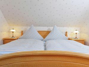 Ein Bett oder Betten in einem Zimmer der Unterkunft Apartment in Eimelrod with Panoramic Views