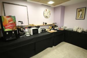 Kuchyň nebo kuchyňský kout v ubytování Hotel Alda Entrearcos