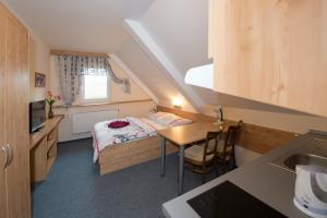 Posteľ alebo postele v izbe v ubytovaní Horský Hotel Skiland