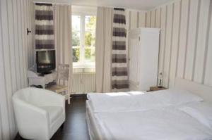 Ένα ή περισσότερα κρεβάτια σε δωμάτιο στο Hotel-Restaurant Pfeffermühle +5 φωτογραφίες