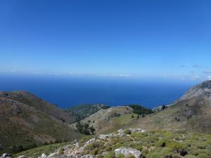 a view of the ocean from the top of a mountain at Calypso in Agia Roumeli