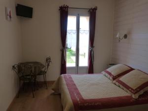 Katil atau katil-katil dalam bilik di Gîte du Pagoulin - Gîte