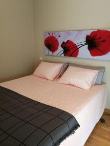 Ένα ή περισσότερα κρεβάτια σε δωμάτιο στο 18 Torres El Pilar