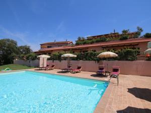 The swimming pool at or close to Farmhouse in Montalto near the Beach