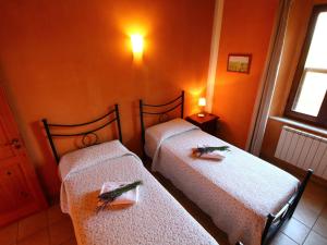 A bed or beds in a room at Farmhouse in Montalto near the Beach