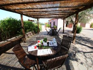 A patio or other outdoor area at Farmhouse in Montalto near the Beach