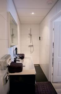 Koupelna v ubytování Studio's de Domburger