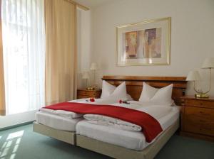 Postel nebo postele na pokoji v ubytování Hotel Goldener Anker