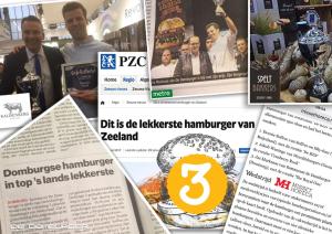 
a magazine with a picture of a man eating a hamburger at Studio's de Domburger in Domburg
