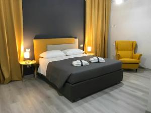 A bed or beds in a room at Sensation House