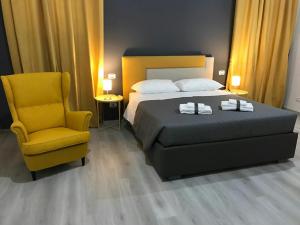 A bed or beds in a room at Sensation House