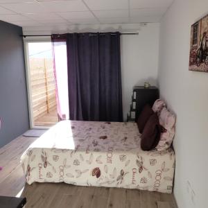 A bed or beds in a room at Le Bas de Cilaos