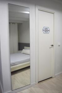 Postel nebo postele na pokoji v ubytování Apart and Benef