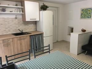 Kuchyňa alebo kuchynka v ubytovaní Apartment Filipas