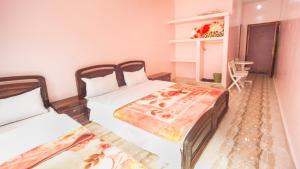 Postel nebo postele na pokoji v ubytování Kasbah Hotel Camping Jurassique