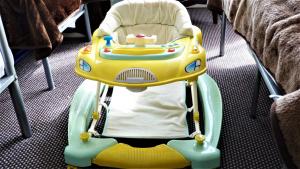 a childs car seat with a toy car at The Berkswell in Blackpool