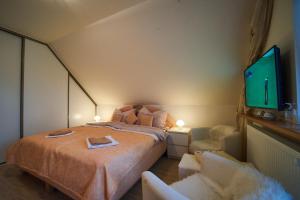 Postel nebo postele na pokoji v ubytování Bluestars Apartments