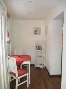 a small room with a table and a chair at Ferienhaus Mack in Wernigerode