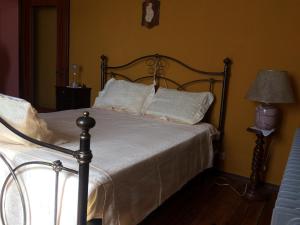 Säng eller sängar i ett rum på Villa Rina