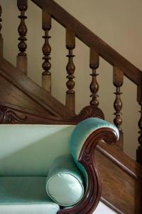 a close up of a wooden stair railing at The Old Manor House in Halford