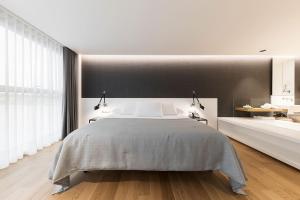 Postel nebo postele na pokoji v ubytování Hotel U Viveiro