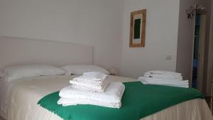 Krevet ili kreveti u jedinici u objektu Villetta Cinquale Versilia