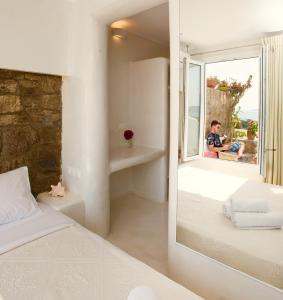 Postel nebo postele na pokoji v ubytování Villa Elina suites and more