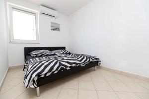 Ένα ή περισσότερα κρεβάτια σε δωμάτιο στο Lux Apartment