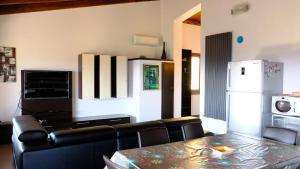 Posezení v ubytování La Baia Casa Vacanze