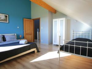 A bed or beds in a room at Escape with Bubble Bath