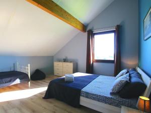 A bed or beds in a room at Escape with Bubble Bath