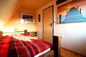 Ένα ή περισσότερα κρεβάτια σε δωμάτιο στο Ferienhaus am Mühlenberg