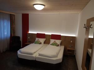 Postel nebo postele na pokoji v ubytování ROOM'Z zimmeraufzeit