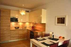 Kuchyňa alebo kuchynka v ubytovaní Apartament Solna 106
