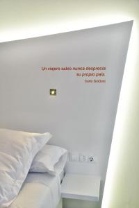Posteľ alebo postele v izbe v ubytovaní Atarazanas Málaga Boutique Hotel