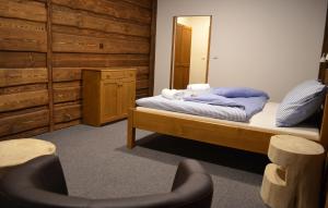 Postel nebo postele na pokoji v ubytování Hotel Kristian