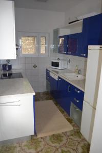 Kuchyňa alebo kuchynka v ubytovaní Villa Prana