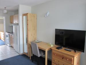 TV o dispositivi per l'intrattenimento presso Schell Motel