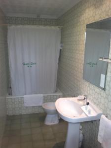 Koupelna v ubytování Hotel Roca