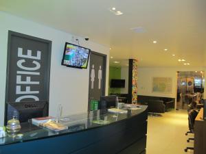 TV a/nebo společenská místnost v ubytování Anhembi Hostel