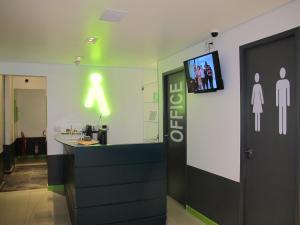 TV a/nebo společenská místnost v ubytování Anhembi Hostel