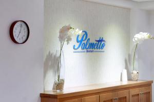 Certifikát, hodnocení, plakát nebo jiný dokument vystavený v ubytování Palmetto Hotel