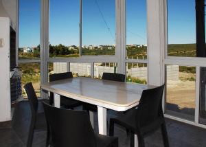 En balkon eller terrasse på Complejo Ali Lafken