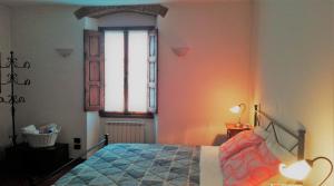 Postel nebo postele na pokoji v ubytování Casa Al Chianti B&B