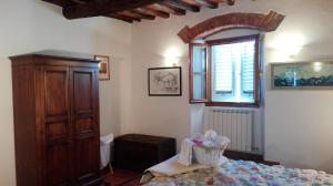 Postel nebo postele na pokoji v ubytování Casa Al Chianti B&B
