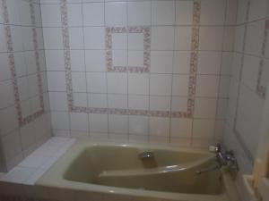 Koupelna v ubytování Hotel Sting
