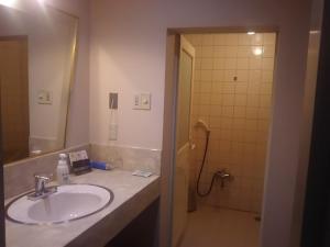 Koupelna v ubytování Hotel Sting